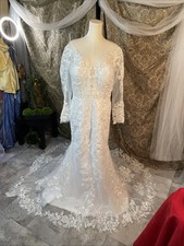 White Lace Wedding Dress intricate floral patternsLong sleeves flowing train 16