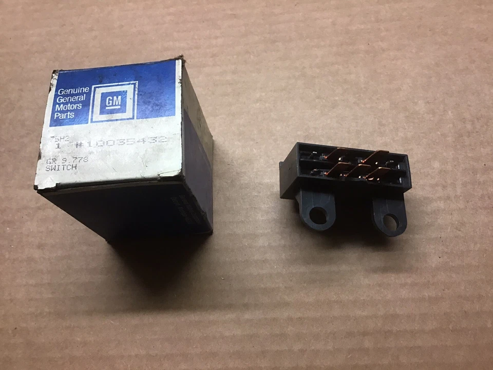 Pontiac 6000 1984-89 interruptor descongelador ventana trasera nuevo en stock Foto 2 de 3