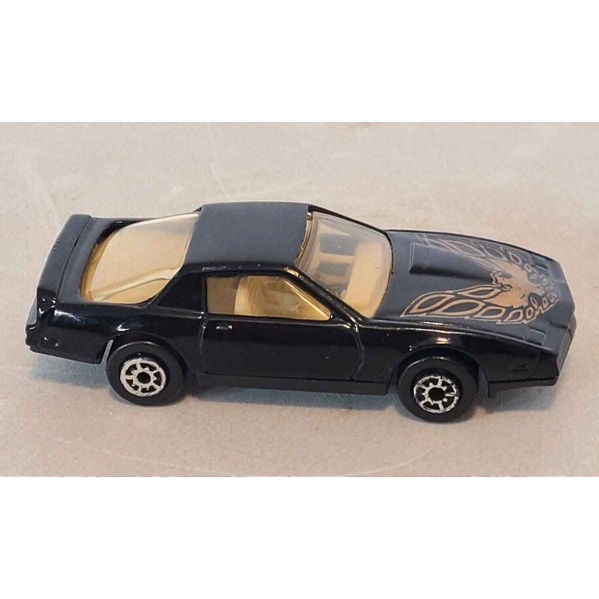 MAISTO 1/64 PONTIAC FIREBIRD TRANS AM Black / Tan Interior / Gold