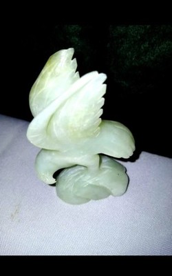 Carved Green and White Jade Eagle with wooden base