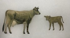 Antique DeLaval Cream Separator Cow & Calf Tin Die Cast Advertising Sign
