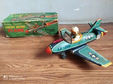Rare vintage battery powered tin toy fighter Aircraft of 50's made in Japan.