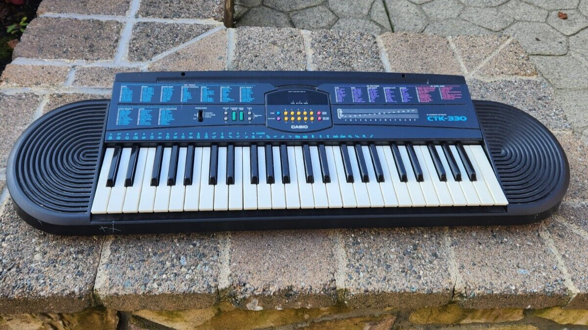 Casio CTK-330 49-Key Electronic Keyboard with 100 Tones-image