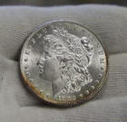 1882 US Morgan Silver Dollar $1 Nice Unc Edge Toning