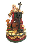 Musical figurine of Santa playing the cello “We Wish You a Merry Christmas” — photo 1