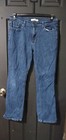 Levi’s 515 Boot Cut Jeans Womens Size 12 Distressed Dark Wash Flap Pockets Blue — photo 1