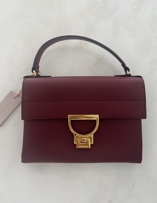 Coccinelle Merlot Leather clutch  Handbag