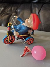Vintage Celluloid boy on Tin Litho Bike with Ballon Made in Japan Wind Up