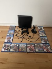 Sony PlayStation 4 500GB - Schwarz, Inkl. 2 C...