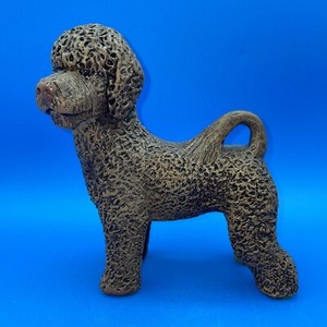 VINTAGE FIGURINE OF A PORTUGUESE WATER DOG SIGNED BY ARTIST T C SCHOCH 1993