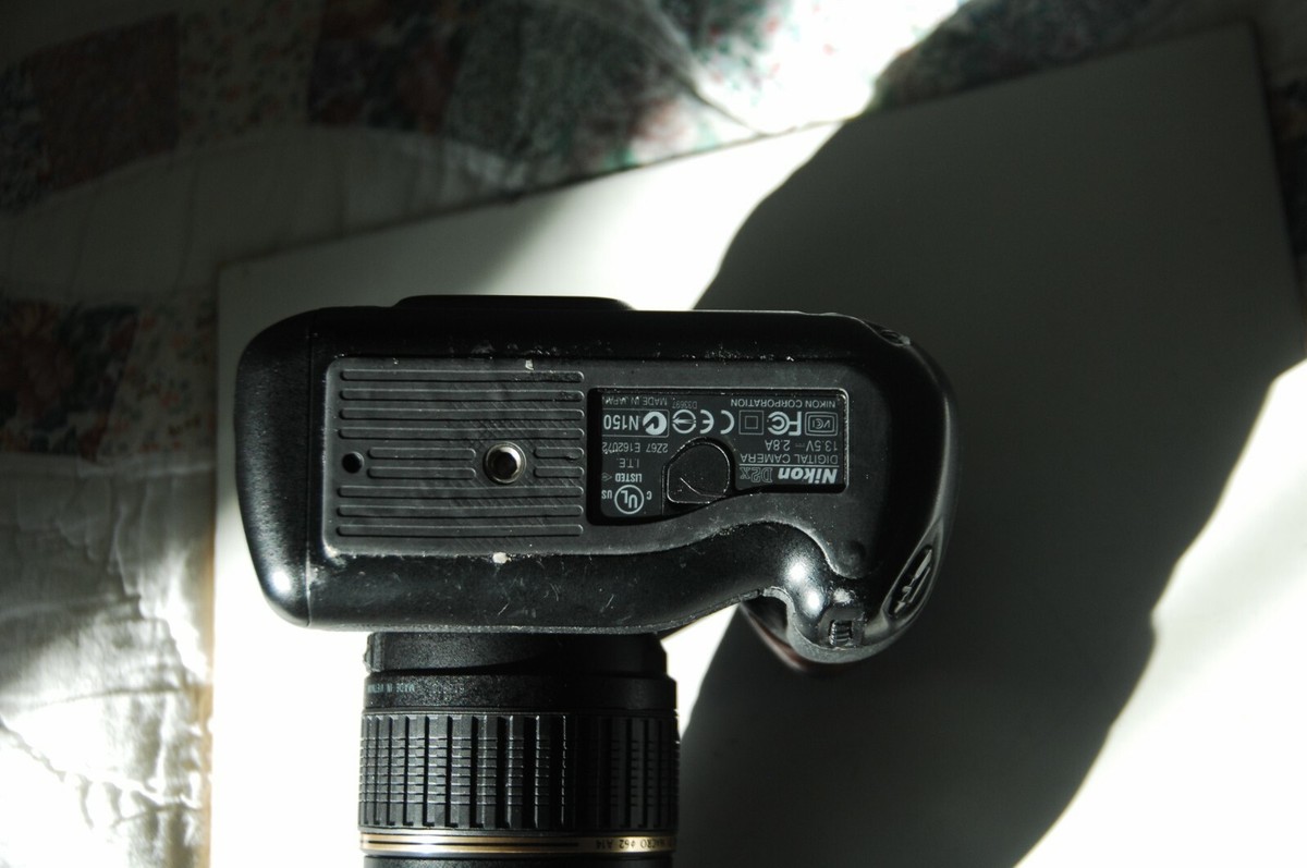 Nikon D2X, 146,302 shots, Tamron 18-200mm XR DiII AF lens, charger