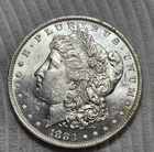 1883 O Morgan Silver Dollar. Estimated Uncirculated 63. Very Bright! A0829.