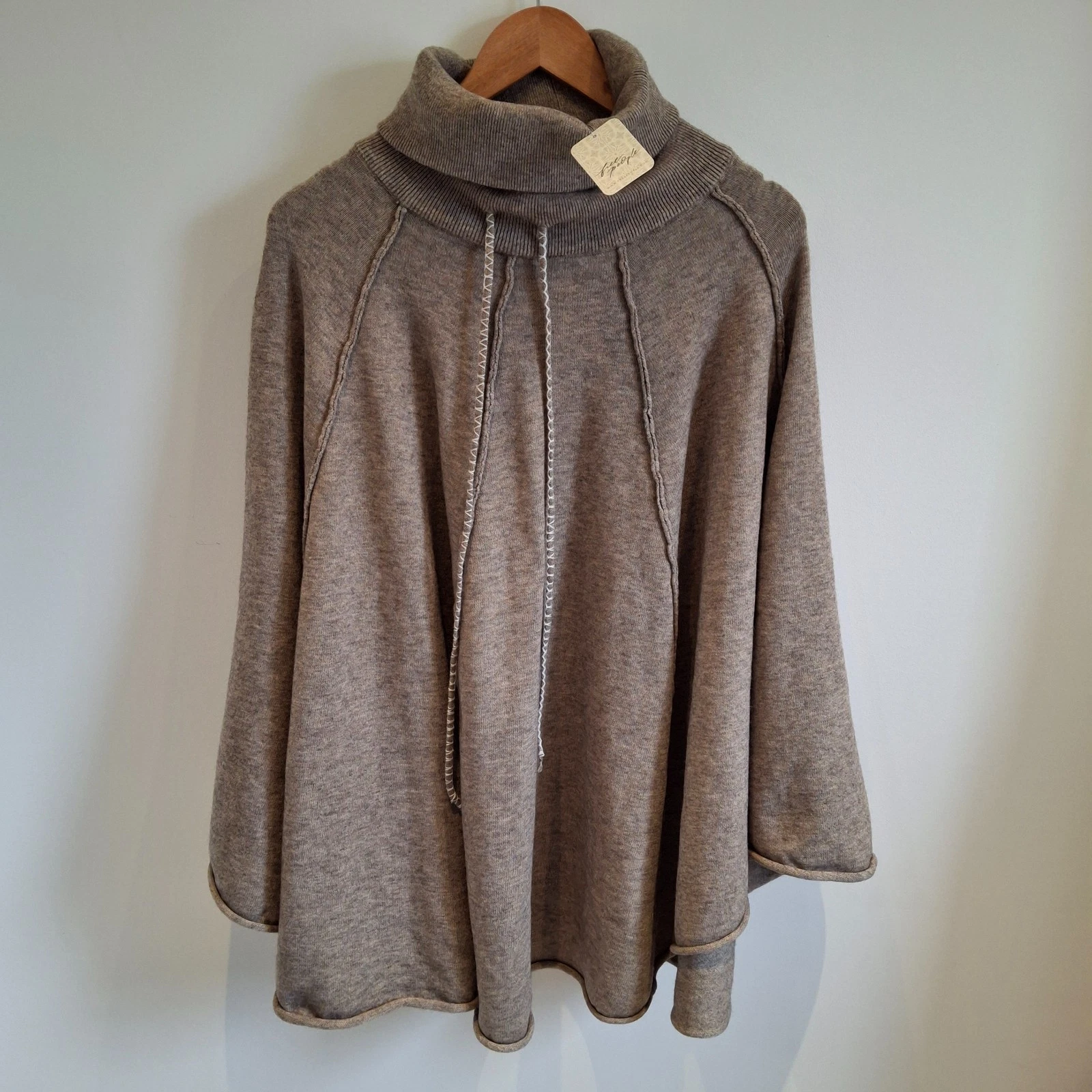 Free People Knitted Tell me more Poncho Women's One Size Neutral Roll Neck NWT