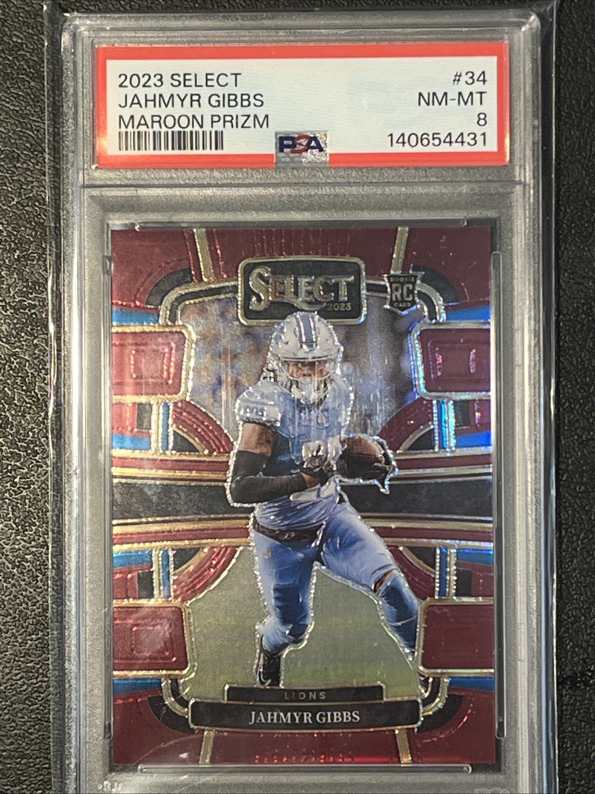 Jahmyr Gibbs - 2023 Select - Maroon Prizm #/149 - PSA 8 - #34 E88