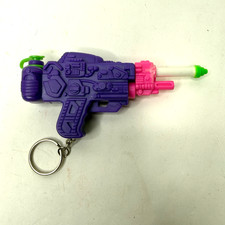 VINTAGE 1993 SUPER SQUIRTER WATER SPACE GUN KEYCHAIN Purple