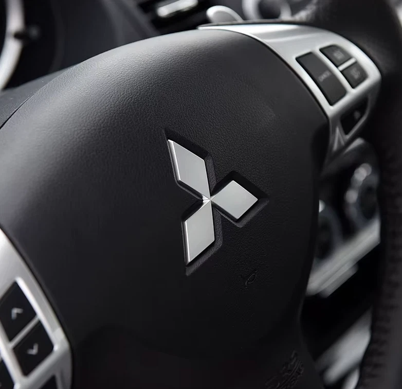 Emblema de volante para Mitsubishi ASX Lancer Eclipse Outlander L200 Mirage Foto 3 de 4