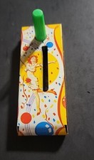 U.S. MetalVintage Tin Toy Yellow Noise Maker   