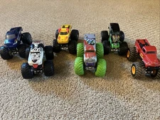 Feld Motor Sports INC. Plastic Grave Digger Monster Jam Truck Lot Of 6