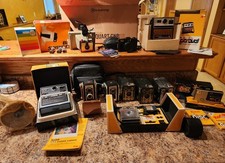 11 vintage cameras spanning 1930s to the early 1980s lot.
