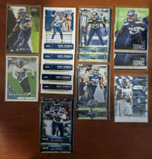 EARL THOMAS FOOTBALL LOT OF 16 CARDS, 8 DIFFERENT, 1 ROOKIE - LIST PRICE $17