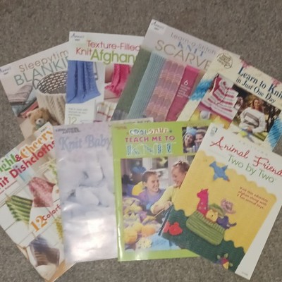 Lot of 8 different knit pattern booklets. blankets, scarves, baby items, etc