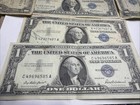 Lot of 12 1957 $1 Silver Certificates circulated — photo 2