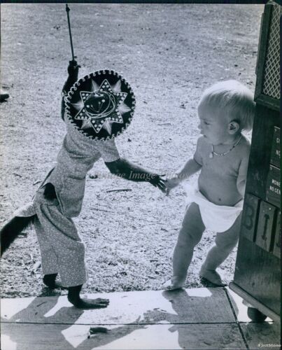 1979 Toddler In Diaper Holds Hands With Monkey In Sombrero Animals Photo 8X10 - Picture 1 of 2
