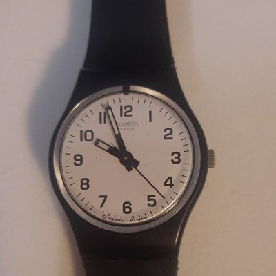 Swatch Swiss Made Quartz Analog Black Plastic Strap White Dial Arabic Numerals