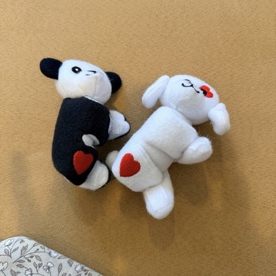 Mini attachable plush wrap around Hug stuffed animal stuffies.