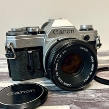 Canon AE-1 SLR 35mm Film Camera w/ Canon Lens FD 50mm F1.8 s.c. From Japan