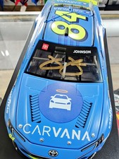 JIMMIE JOHNSON SIGNED 2025 CARVANA 700TH START 1/24 ARC DIECAST CAR. COA. GOLD