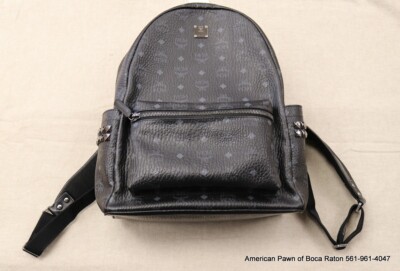 MCM backpack  Model number: MMK6SVE38BK001 Black / gray /  pre owned /
