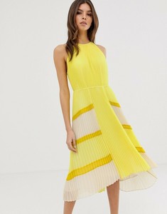 nellina dip hem pleated dress