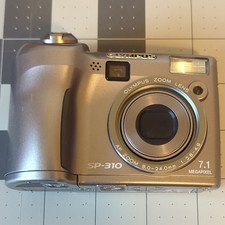 Olympus SP-310 7.1MP Silver Compact Camera 3x Zoom 2.5in LCD USB AA