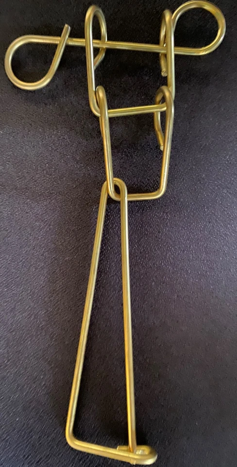 Rompecabezas mecánico de alambre de latón macizo de FreeMe Foto 4 de 4