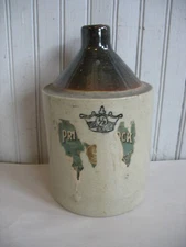 RCP Robinson Clay products 1/2 gal stoneware jug w partial Whiskey label OHIO