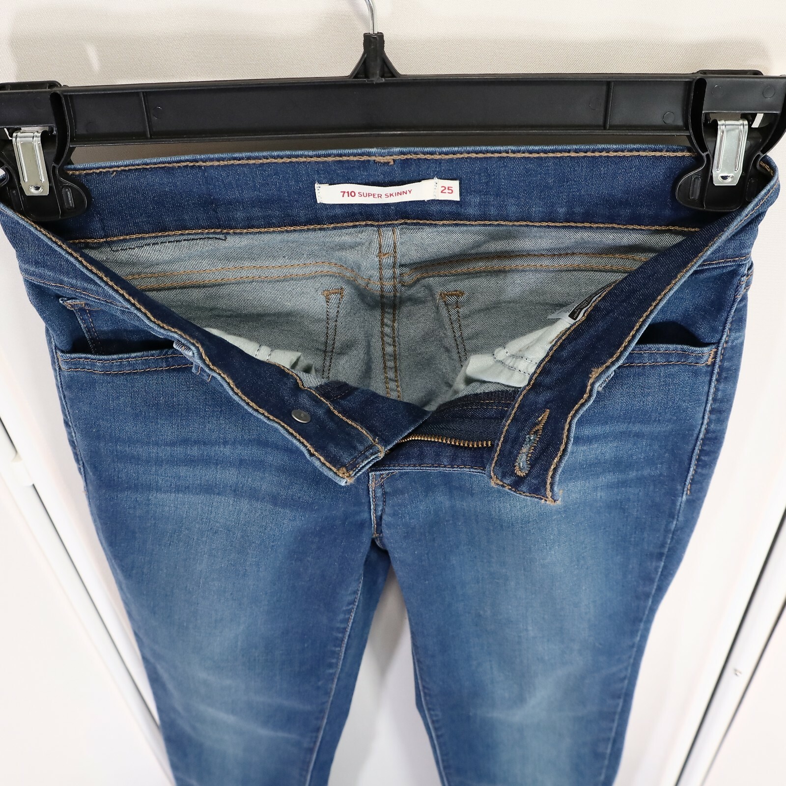 Levis 710 Super Skinny Jeans Size 25 Womens Blue Stretch Denim Irregular Euc