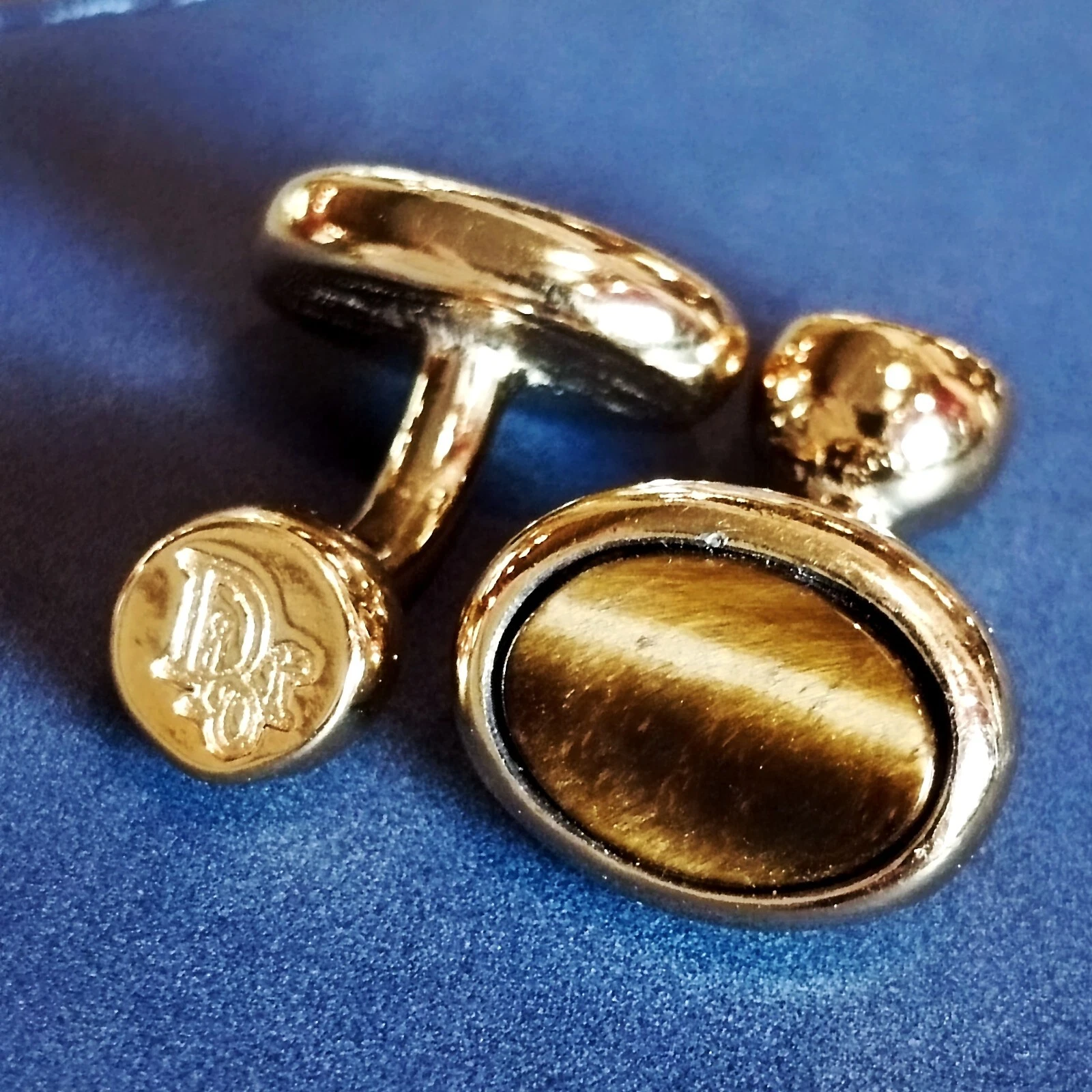 1970 boutons de manchette œil de tigre Christian Dior ton or pour bijoux hommes