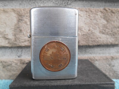 VINTAGE UNBRANDED FLIP TOP CHROME CIGARETTE LIGHTER. GENUINE ASIAN COPPER  COIN