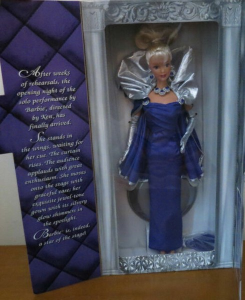 doll stands spotlight