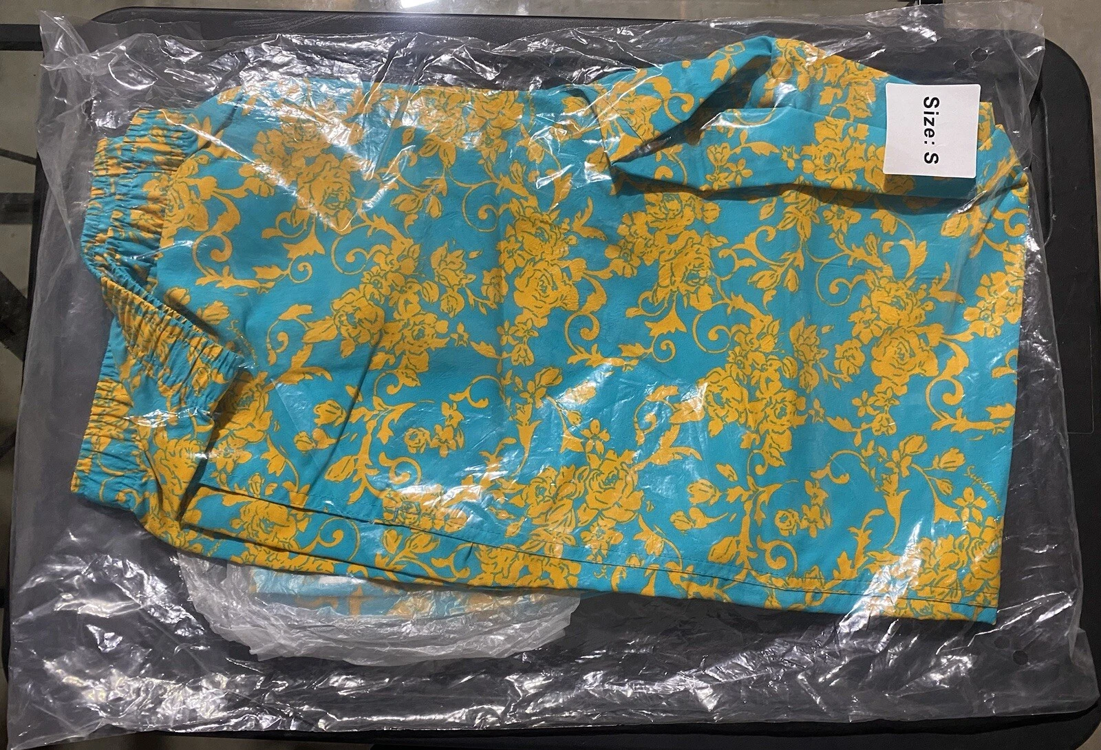 pantalon échauffement suprême sarcelle floral
