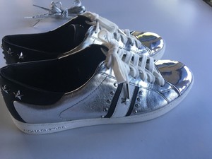 shiny silver tennis shoes