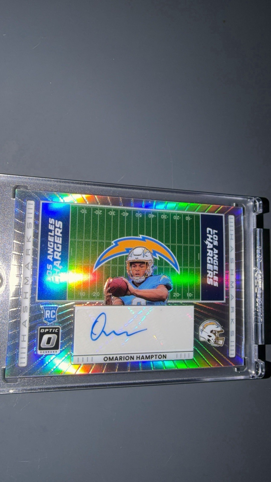 Panini Optic NFL  2025 Hashmarks Omarion Hampton Auto NM-OH