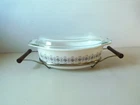 Vintage Pyrex Empire Scroll 1965 casserole dish with lid and cradle promotional