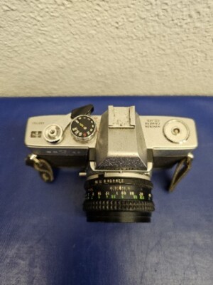 Minolta SRT-100 35mm SLR Film Camera with 55mm F1.9 MC rokkor PF