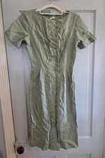 Green vintage Kay Windsor dress features double-breasted button-front design