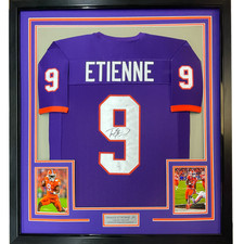 FRAMED Autographed/Signed TRAVIS ETIENNE JR 33x42 Clemson Purple Jersey JSA COA