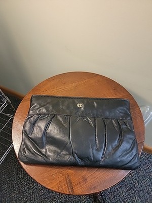 Vintage black leather pleated clutch with metallic monogram