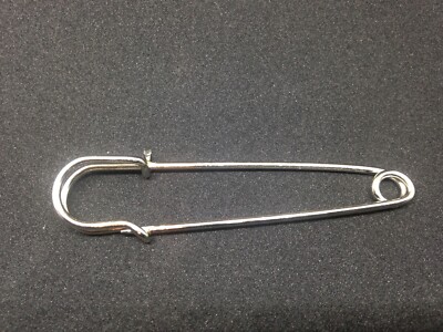 Pin's cravate en bronze poney stock spectacle cheval attrape-rats