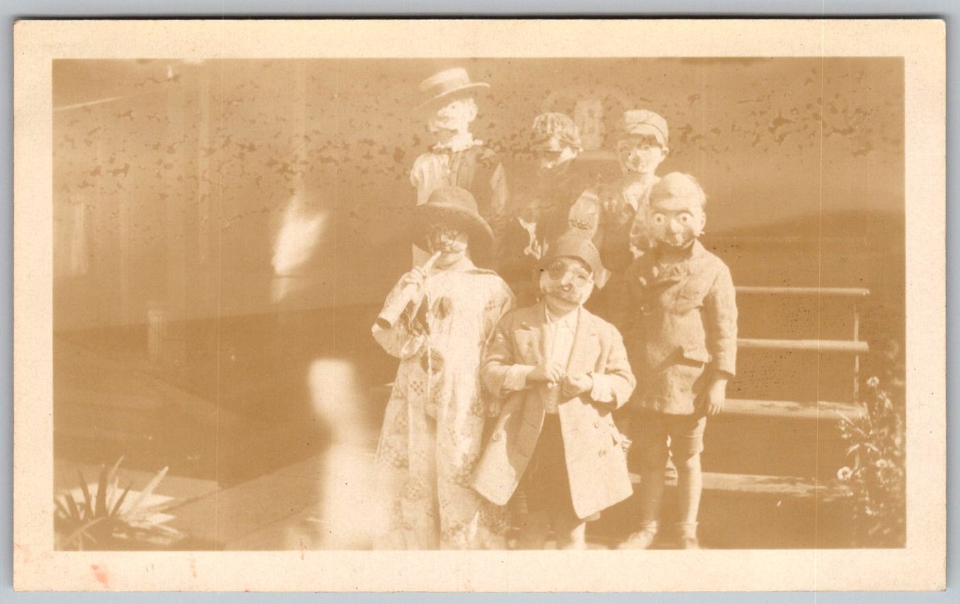 Vtg B&W Snapshot Children in Halloween Costumes Masks Clown Sepia Photo 1920s